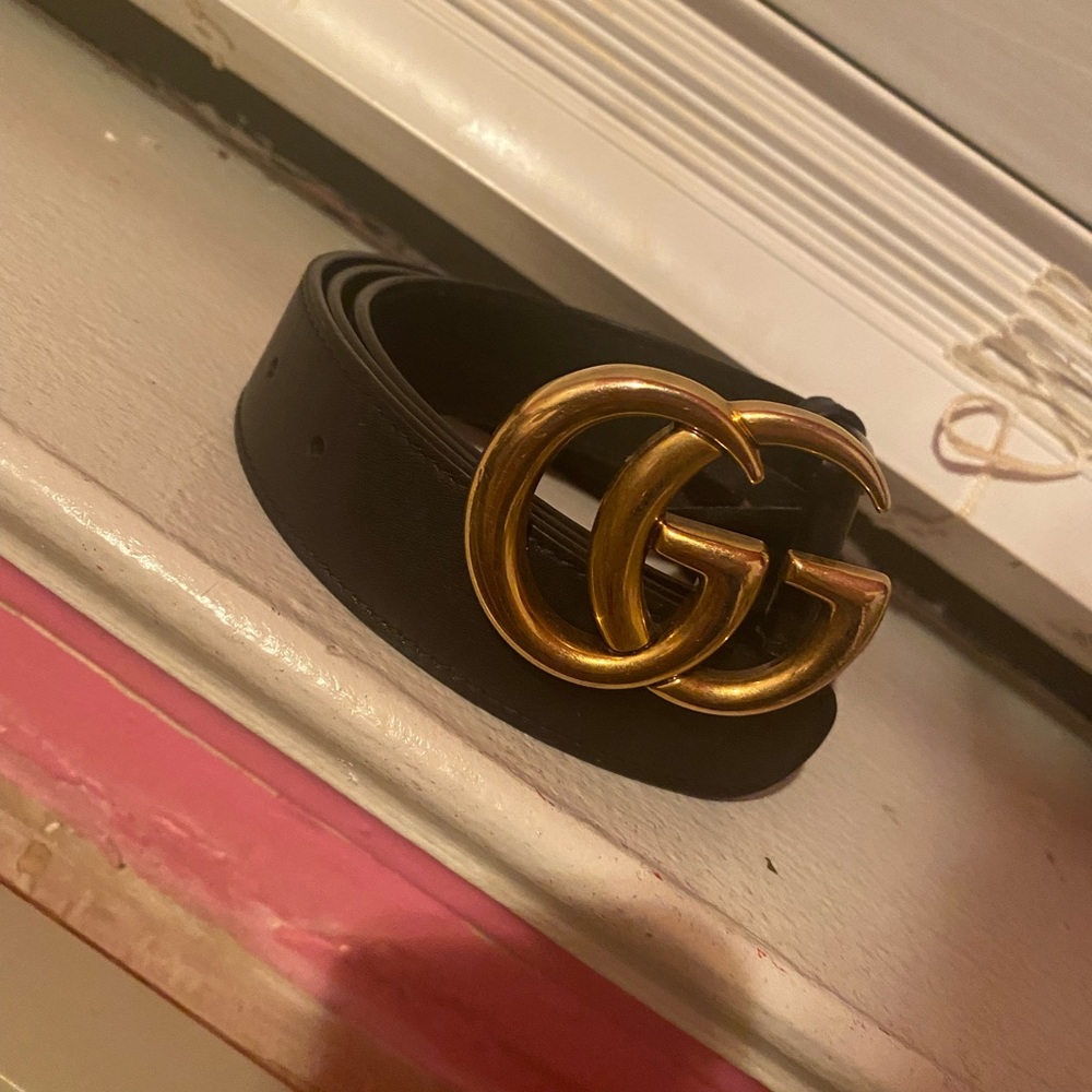 Black and gold gucci belt